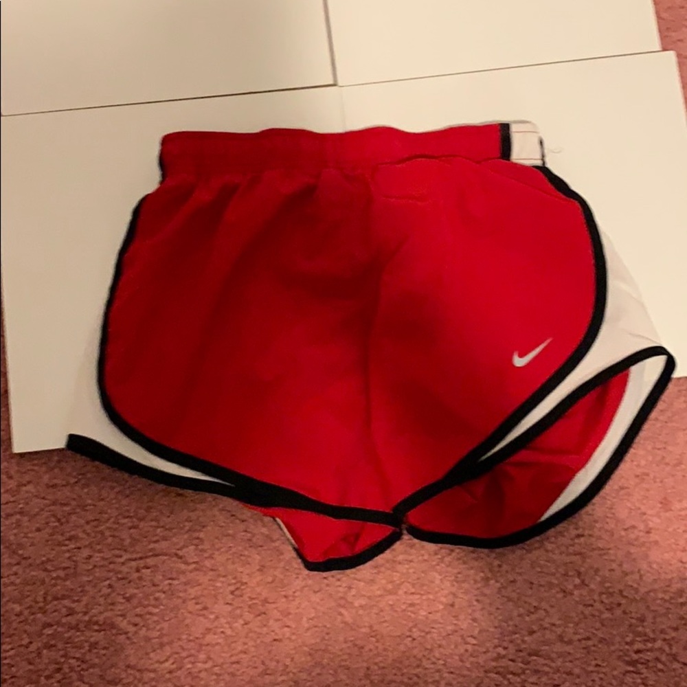 red and black nike running shorts